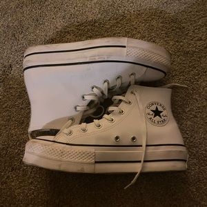slightly worn high top converse